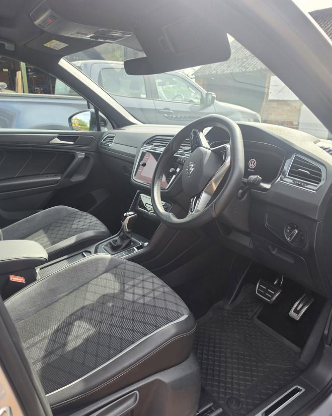 Clean grey interior of a Volkswagen Tiguan after an interior valet
