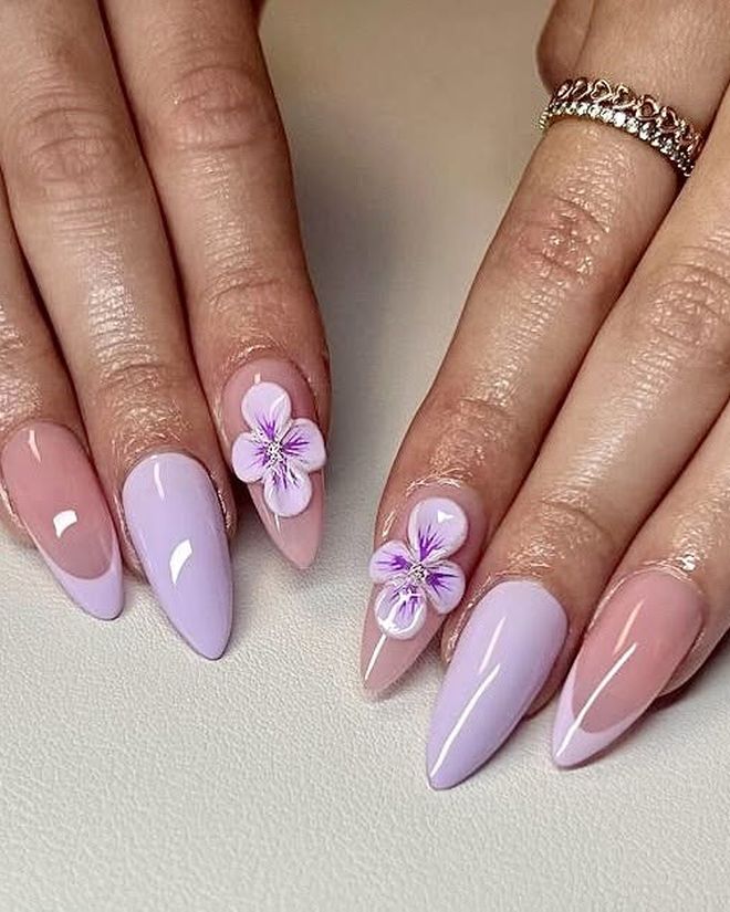 Lilac nails with a hand-painted 3D white flower design
