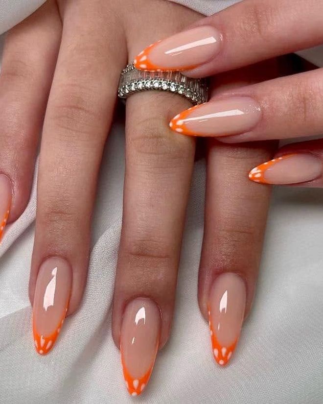 Fine orange French tip line on natural nails