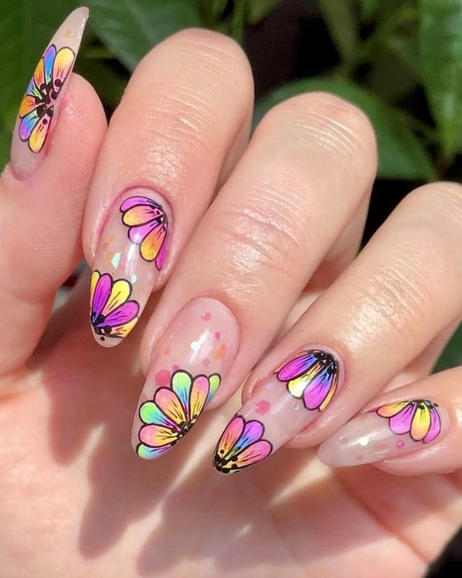 Hand-painted rainbow butterfly-wing nail art on almond-shaped nails